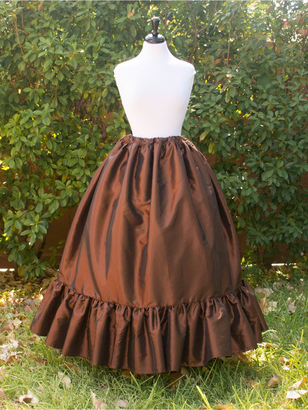 Calypso Brown maxi skirt with ruffled hem and tie waist,